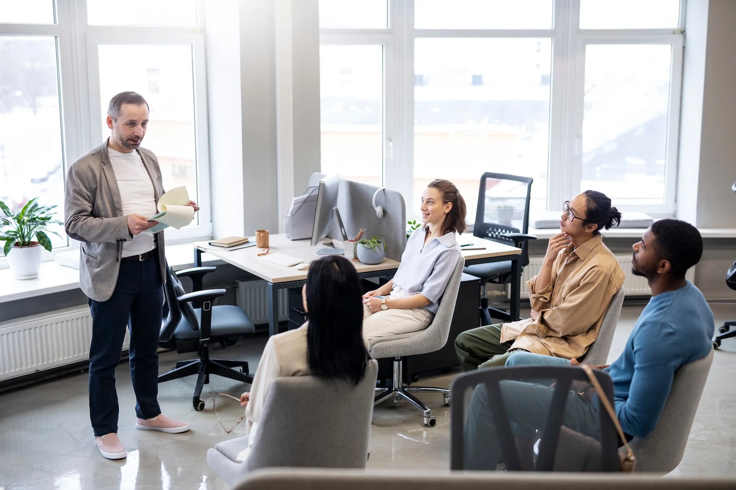 medium-shot-colleagues-learning-work_23-2149300711